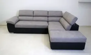 Divano angolare grigio e nero, un vero gioiello di design, forse il divano più costoso del mondo per la sua esclusività.