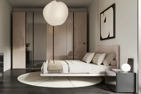 Camera da letto con letto rosa, armadio a specchio e lampada a sospensione. Idee per appartamenti moderni.