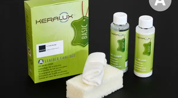 Kit Keralux per la cura della pelle anilina: pulitore, lozione e spugnetta.
