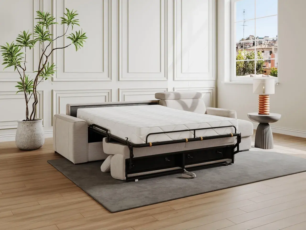 Divano letto aperto, pronto per la riparazione del meccanismo. Materasso bianco, struttura metallica nera, cuscini beige.