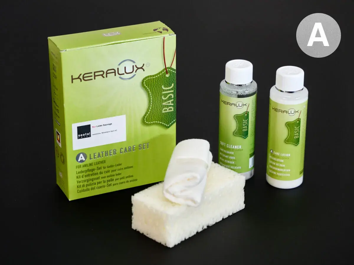 Kit Keralux per la cura della pelle anilina: pulitore, lozione e spugnetta.