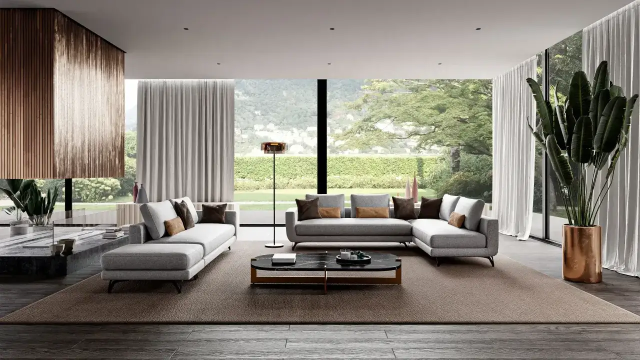 Elegante soggiorno con divano modulare grigio, tavolino nero e grande finestra panoramica.