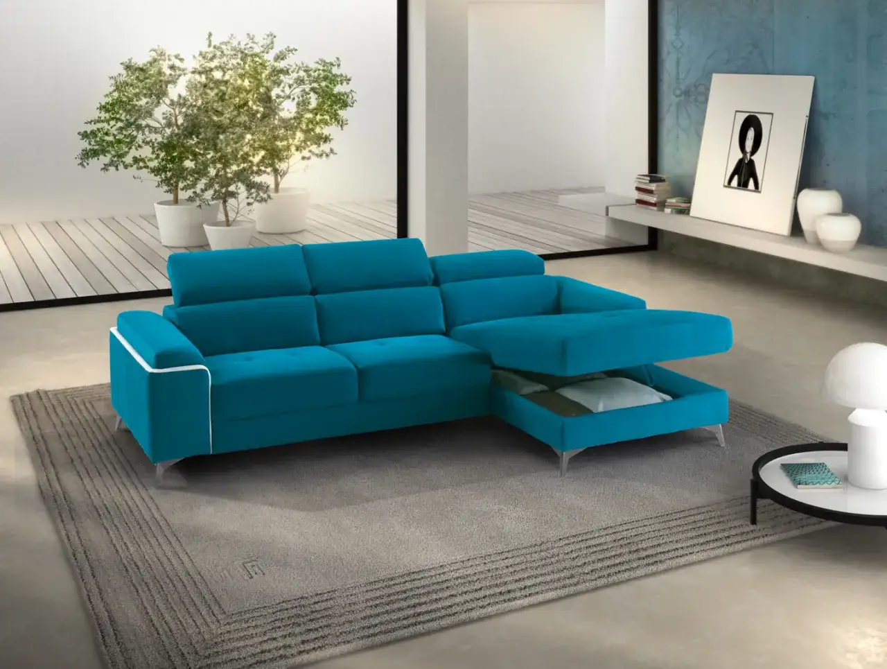 Divano letto angolare blu turchese con chaise longue estraibile, ideale per ottimizzare lo spazio. La sua lunghezza da aperto &egrave; perfetta per ospitare comodamente.