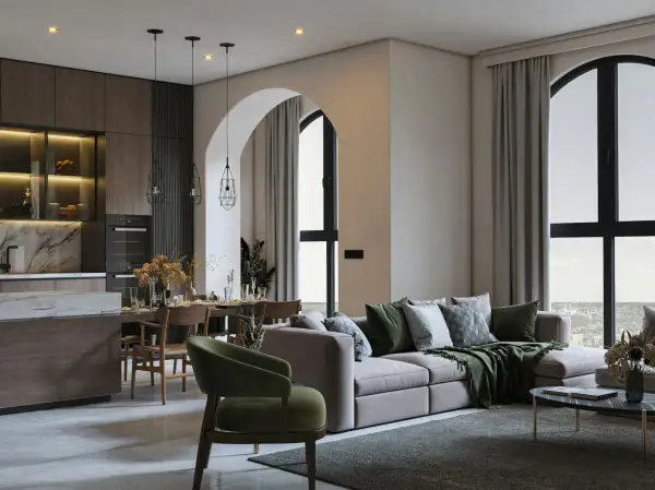 Soggiorno e cucina open space con tavolo da pranzo e divano, in un elegante stile essenziale.