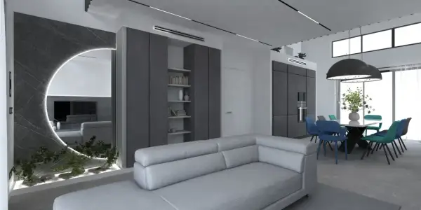 Un soggiorno moderno con divano grigio chiaro, pareti in vari tipi di grigio, specchio circolare illuminato e zona pranzo con sedie colorate.